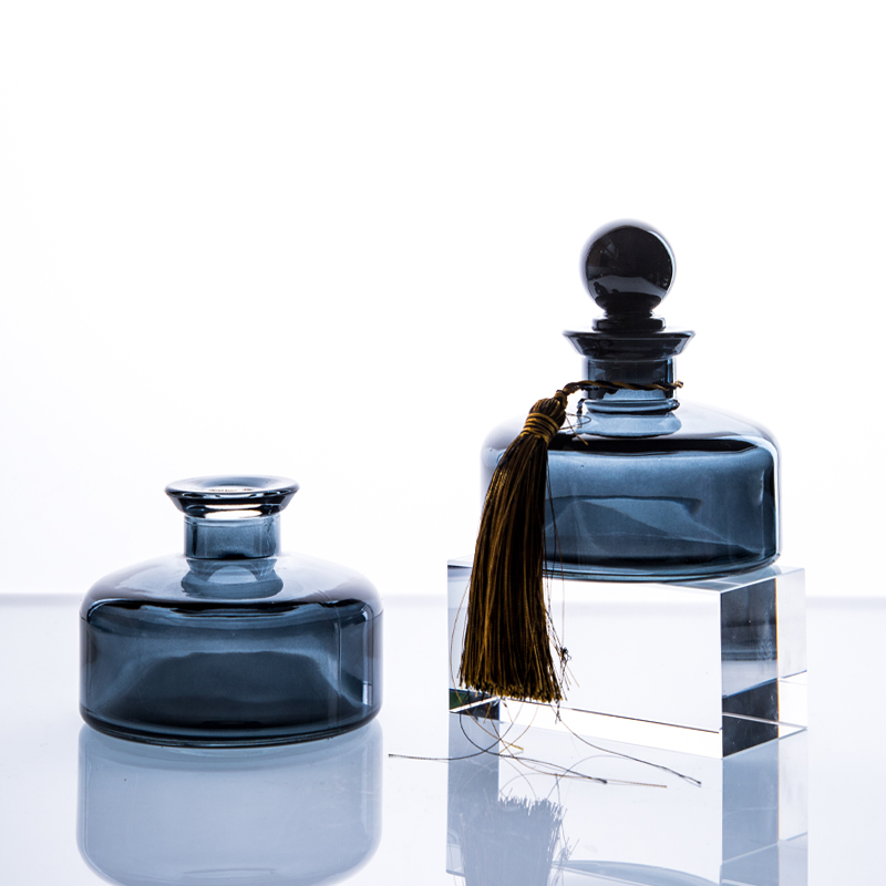 two blue essential oil glass jar packagings 01