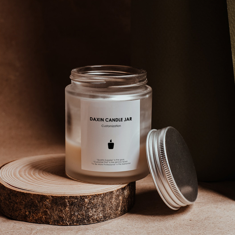 an open decorative candle packaging with screw on lid 01
