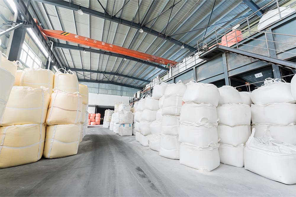 Raw materials for glass production sitting in a warehouse 01